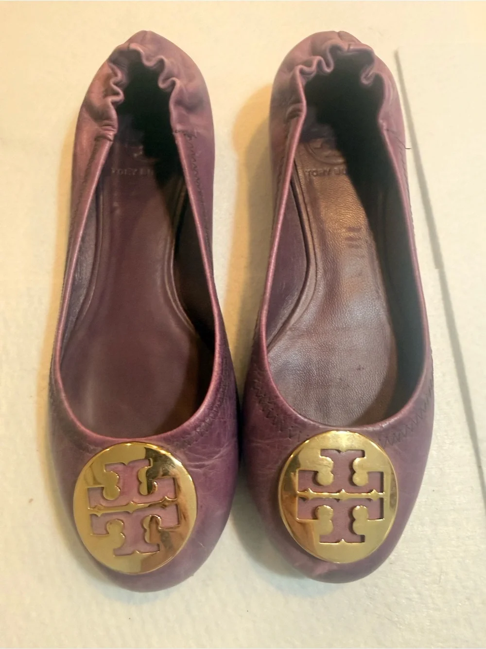 Tory Burch Plum Leather Logo Ballet Flats with Gold Medallions